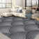 Jilliana Washable Geometric Machine Woven Polyester Area Rug in Black