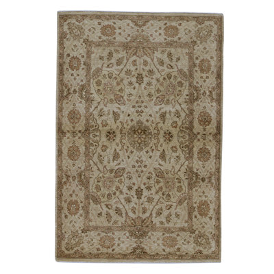 Hand Knotted Wool Area Rug in Cream