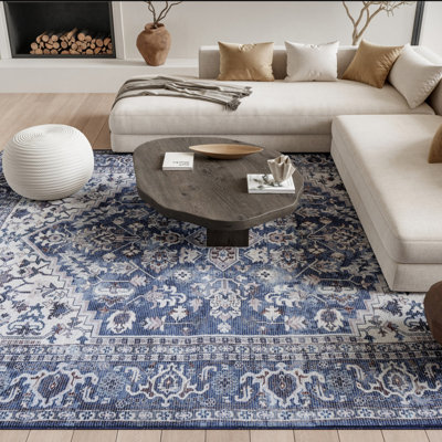Tapis floral lavé bleu et ivoire 9 pi x 12 pi tissé à la machine