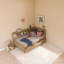 Lit de jour simple en bois avec tablettes de rangement et 3 tiroirs-116484156