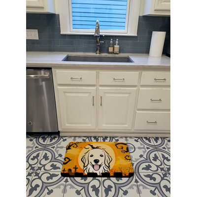 Tapis intérieur / extérieur jaune / blanc cassé en microfibre Donjanae