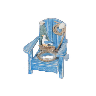Chaise en bois avec bougeoir bleu