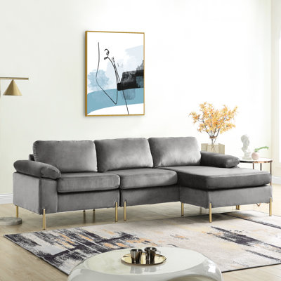 Velours gris, canapé modulaire en forme de L, structure en bois massif, pieds en métal, accoudoirs, coussins amovibles, rembourrage en mousse, velours de socialisation avec méridienne, fabrication, finition des pieds en laiton doré, coussins rembourrés de mousse