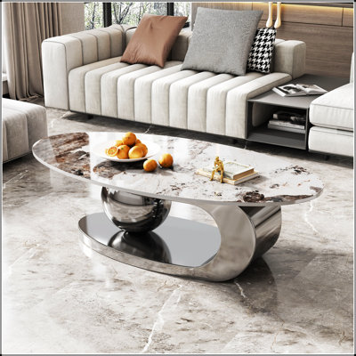 Table basse ovale en faux marbre de 49,2 pouces avec base en acier inoxydable durable, parfaite pour les salons modernes et élégants.