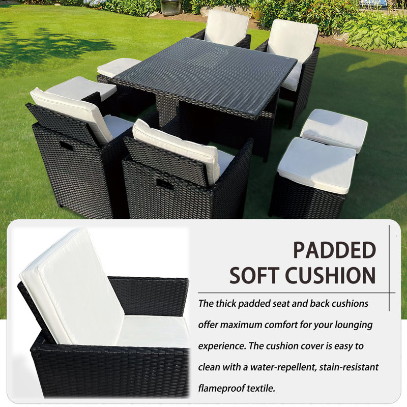 Cateisha 8 - Person Wicker Patio Dining Set with Square Table , Cushions Included, Black