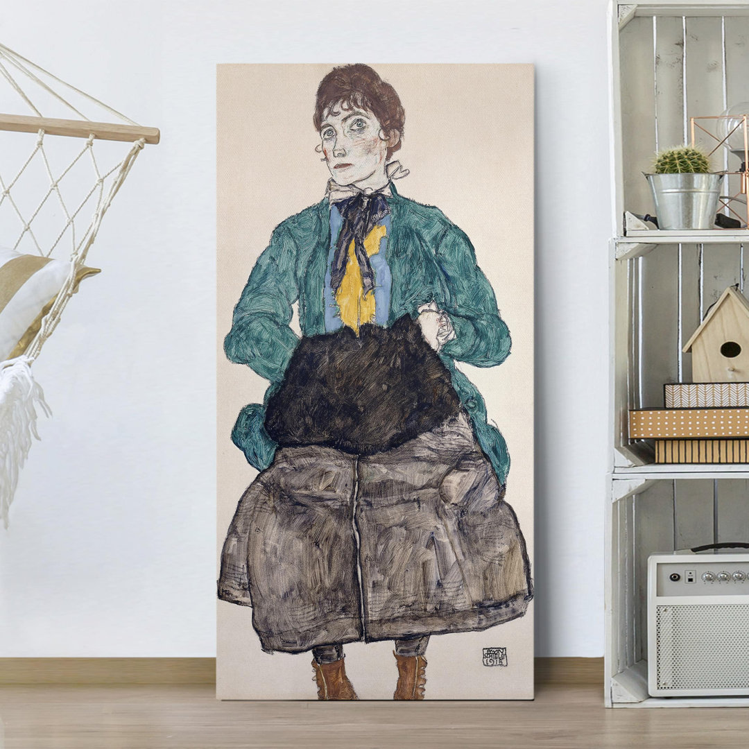 Leinwandbild Frau in grüner Bluse mit Muff von Egon Schiele