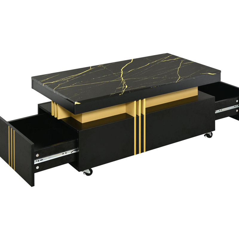Table basse noire avec surface en faux marbre et espace de tiroir