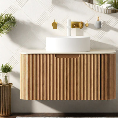 Meuble-lavabo et lavabo élégants et peu encombrants, fini bois naturel, idéal pour les salles de bains modernes.