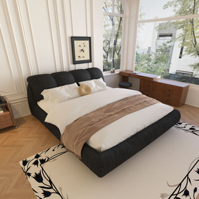 Lit plateforme tapissier de luxe avec dossier rembourré surdimensionné et structure en bois massif, convenant à plusieurs hauteurs de matelas