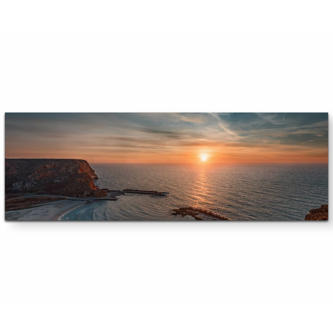 Leinwandbild Sonnenaufgang am Strand