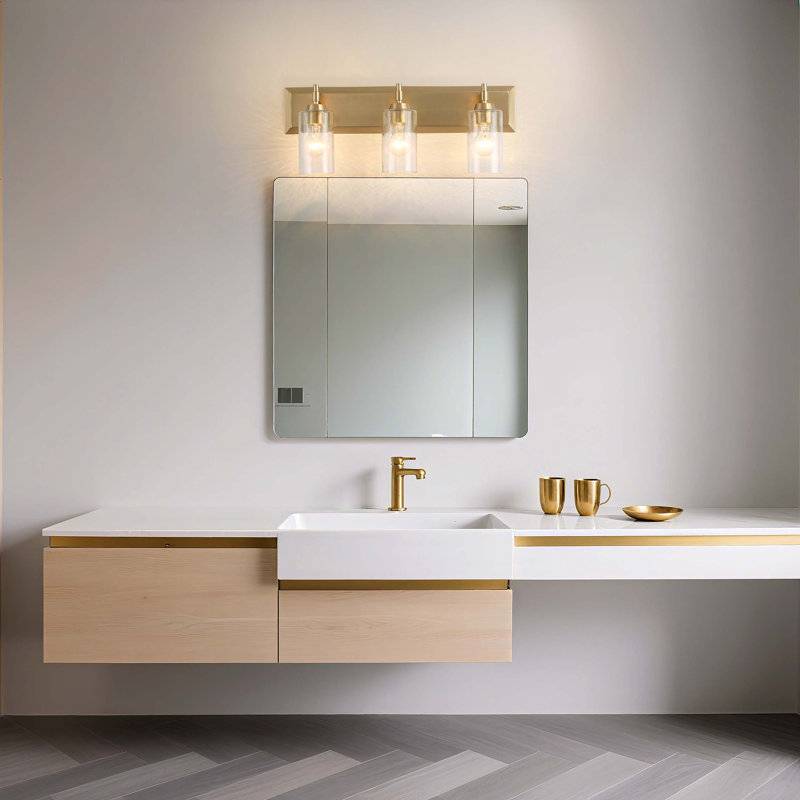 Meuble-lavabo 3 lumières Yep par Brilia en laiton champagne brossé avec verre d'eau martelé, Laiton champagne brossé