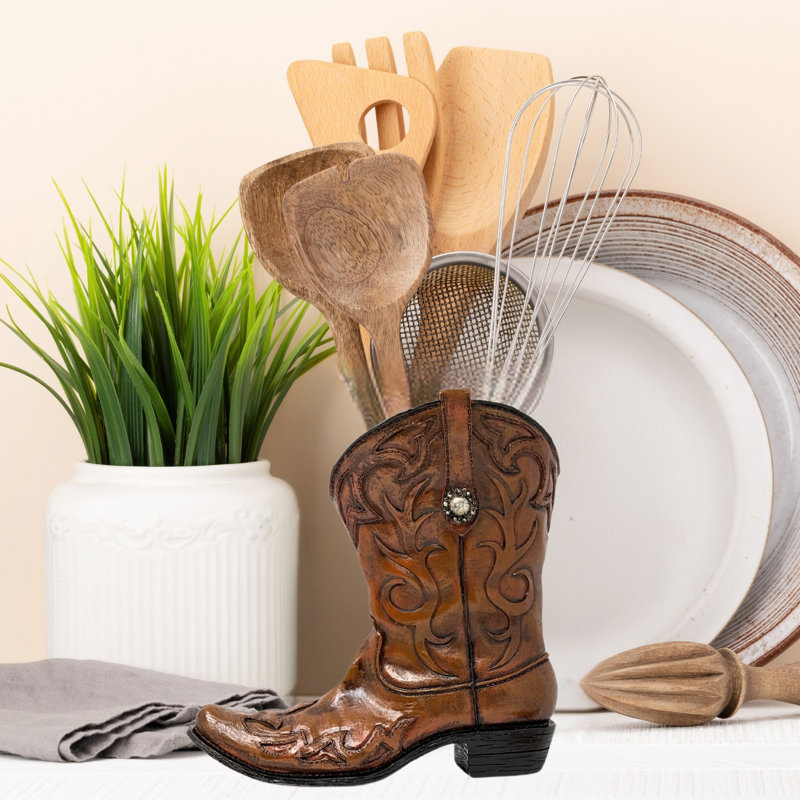 Vase en résine et botte de cowboy