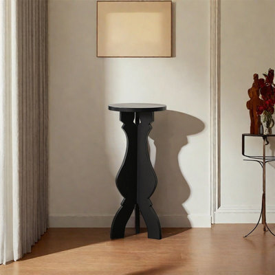 Three-legged black flower stand solid wood storage