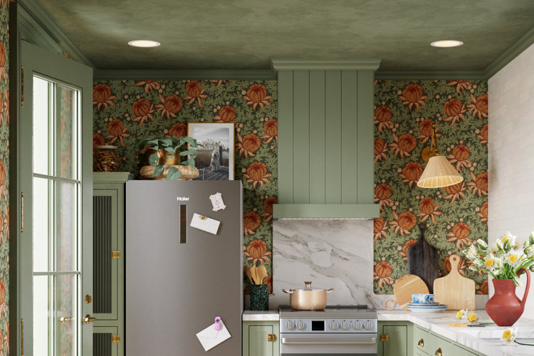 Modern kitchen with floral wallpaper, green ceiling, and recessed lighting