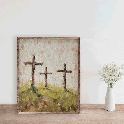 Trois croix sur une pelouse