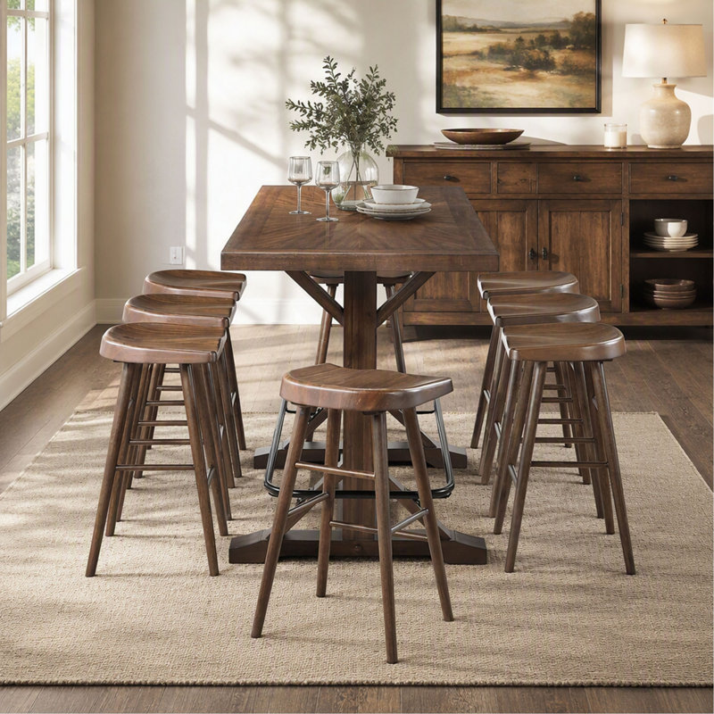 Ensemble de salle à manger de style pub, 9 pièces, fini brun, comprenant une table, un repose-pieds en métal et 8 tabourets sur une structure en bois robuste.