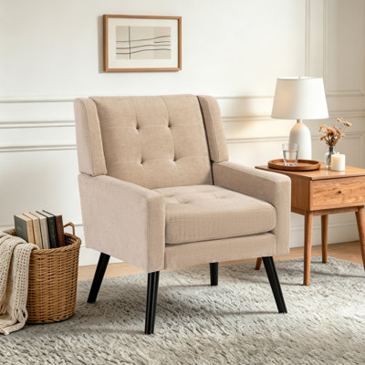 Fauteuil capitonné à dossier large rembourré