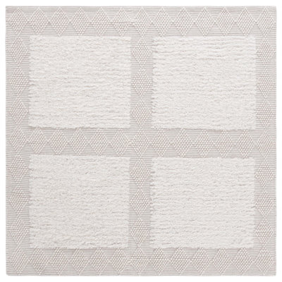 Tapis de couleur unie en laine / coton tissé à la main Natura en ivoire