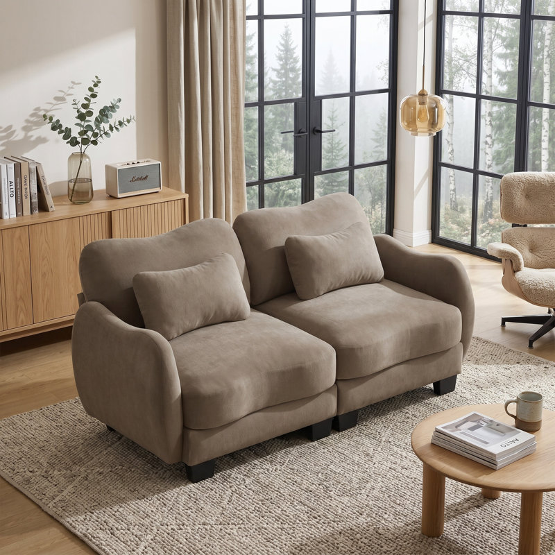 Canapé en chenille Cloud-Comfort avec courbes ergonomiques et coussin lombaire délicat - un soutien moderne et élégant pour les salons