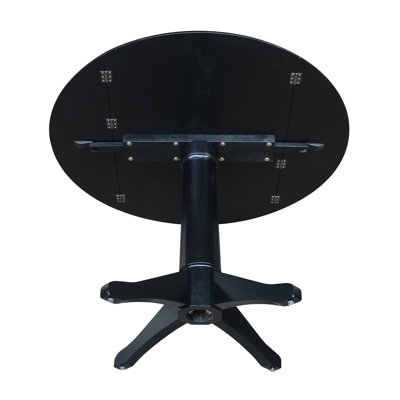 Extendable Round Solid Wood Dining Table