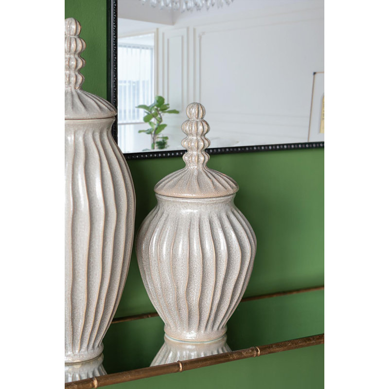 Elegant White Ceramic Jar with Textured Motif and Spherical Finial Lid