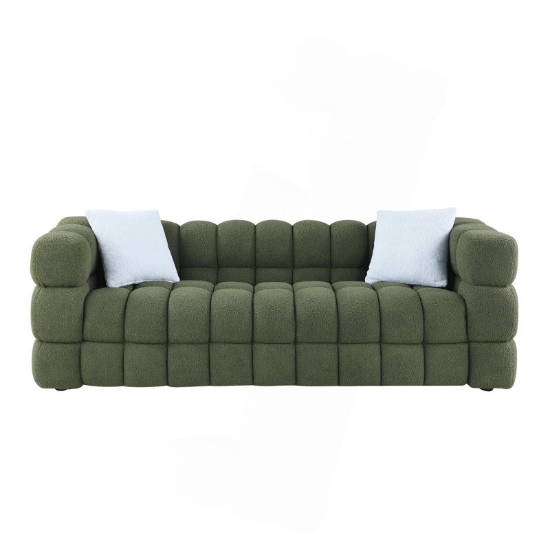 Canapé confortable et élégant avec coussins moelleux et revêtement de qualité supérieure, parfait pour se détendre et recevoir.