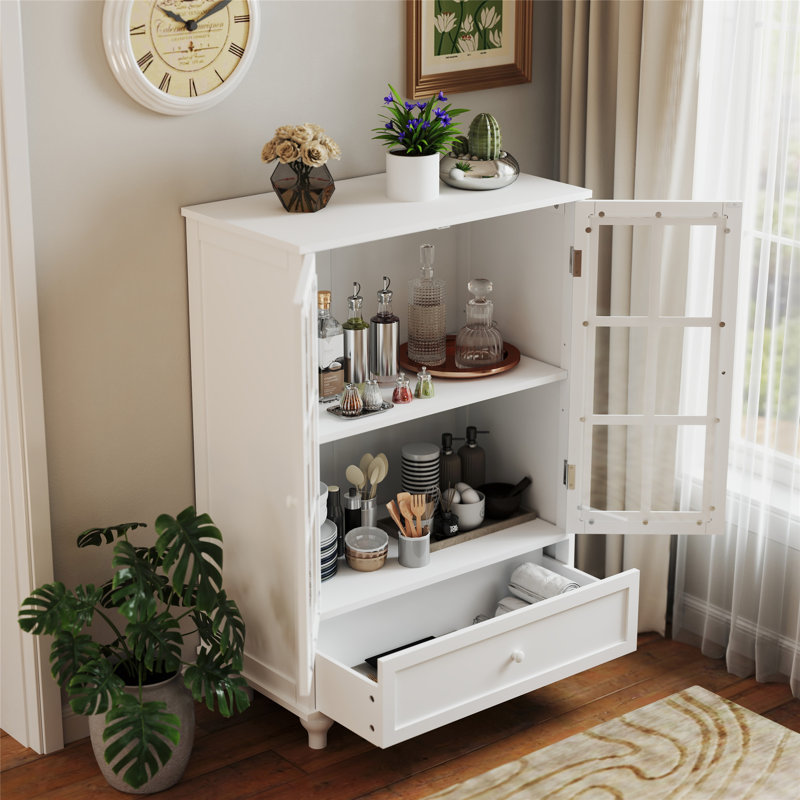 Buffet moderne minimaliste blanc avec portes en verre et tiroir double, idéal pour un rangement et une présentation élégants