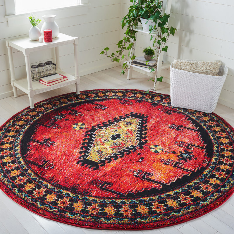 Tapis rouge / noir du Sud-Ouest duchamps, Rond 6 pi 7 po
