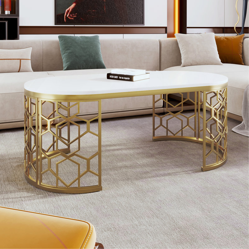 Table basse moderne ovale avec structure en acier inoxydable