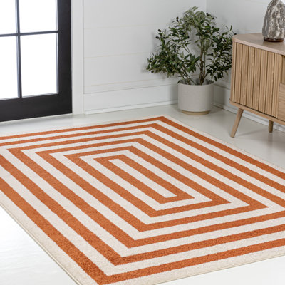 Tapis terre cuite / ivoire Isibeal