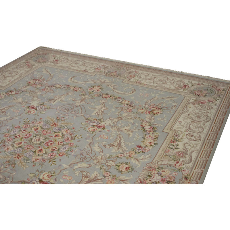 Tapis vert clair et crème noué à la main de haute qualité