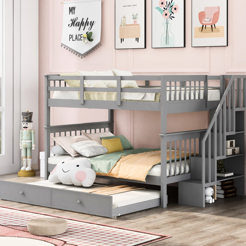 Lit superposé gris avec lit gigogne simple. Structure en bois robuste. Rangement supplémentaire.  Pour chambre à coucher ou dortoir. Aucun sommier tapissier requis. Fonctionnel