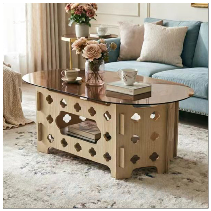 Table basse ovale avec plateau en verre trempé et nid de chat caché, durable et élégant pour la vie moderne