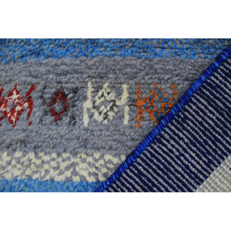Tapis bleu unique 5 pi 4 po x 8 pi 3 po Lovre