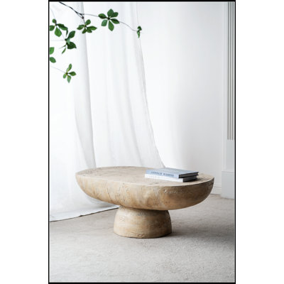 Spacious Cream Cement Oval Coffee Table With Storage, Perfect For Modern And Versatile Living Spaces.