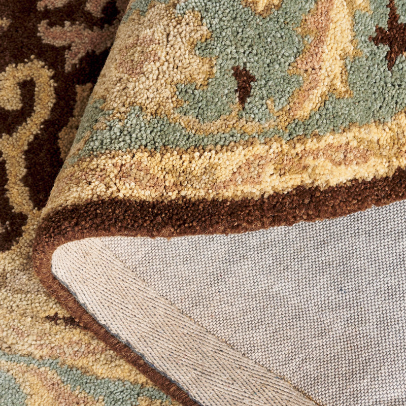 Ivory and Brown Handmade Wool Oval Tufted Rug, 7'6" x 9'6"
