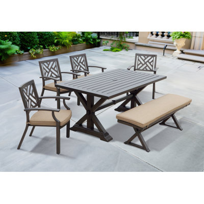 Nicolay 6 - Person Patio Dining Set with Rectangular Table , Cushions Included