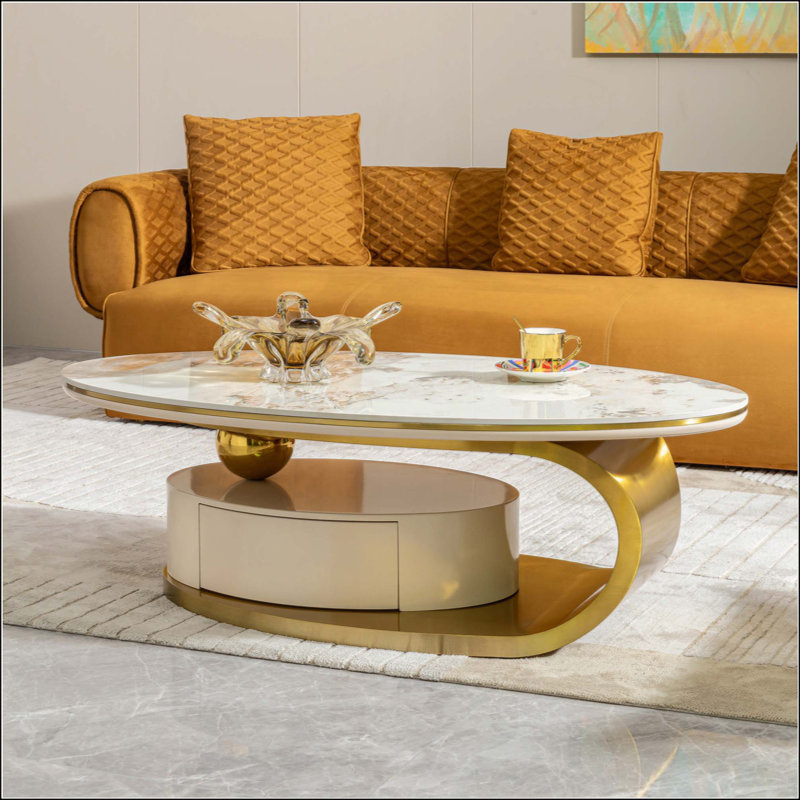 Table basse ovale avec tiroir, plateau de table en pierre frittée moderne avec motif marbré, base en acier inoxydable doré centre de salon de luxe avec rangement