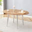 Table de salle à manger ronde extensible avec plateau en bois aggloméré et pieds argentés