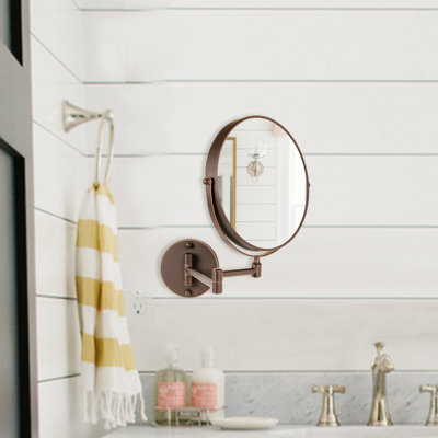 OVENTE 7" Wall Mounted Makeup Mirror with 1X/7X Magnification, Double Sided Magnifying Round Bathroom Vanity Mirror, 360° Swivel Design, Extendable and Folding Arm, Antique Bronze MNLFW70ABZ1X7X