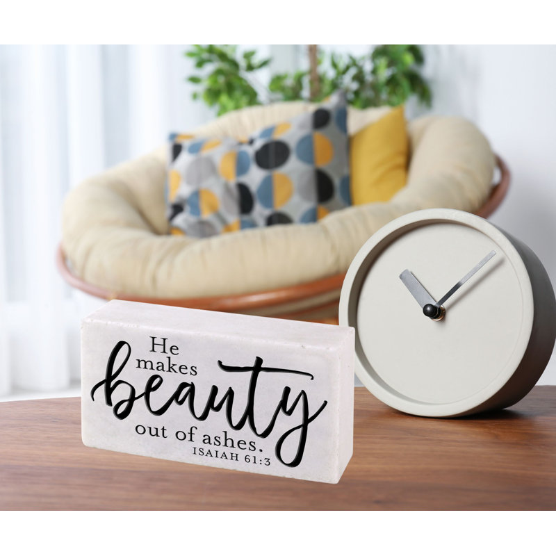 Plaque en pierre moulée «He Makes Beauty»