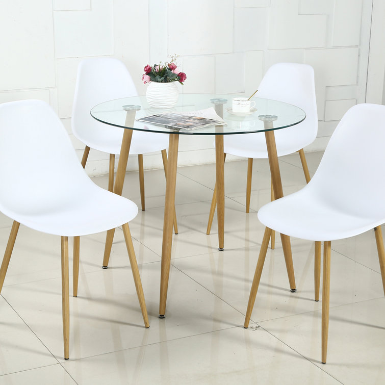 https://assets.wfcdn.com/im/39639937/resize-h755-w755%5Ecompr-r85/1989/198967772/Modern+Dining+Table+Set+Of+5+Pieces%2C+Round+Tempered+Glass+Table+And+4+Kitchen+Chairs+With+Metal+Legs%2C+Dining+Room+Table+And+Chairs+Set+For+Dining+Room%2C+Kitchen%2C+Living+Room+And+Small+Space+%28Round+Table+%2B+4+White+Chairs%29.jpg