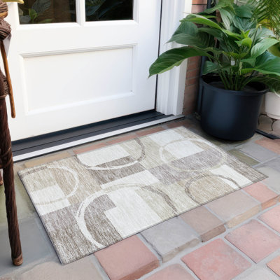 Tapis rectangulaire Aleh avec envers antidérapant