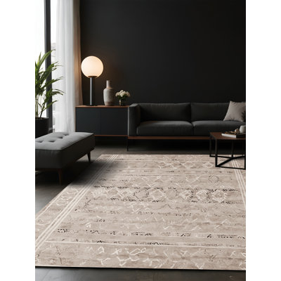Tapis gris soyeux et moelleux
