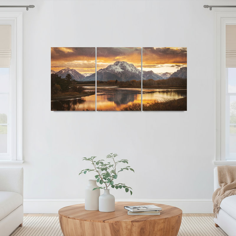 Ensemble de 3 toiles murales représentant un coucher de soleil sur un paysage de montagne, H 30 po x l 60 po
