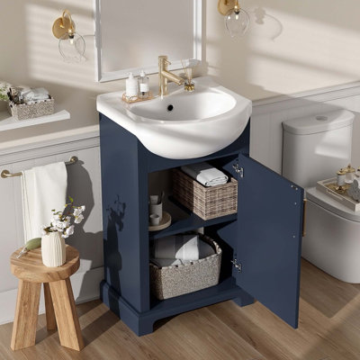 Meuble-lavabo autoportant simple avec porte à fermeture douce et lavabo en céramique durable, parfait pour les petits espaces