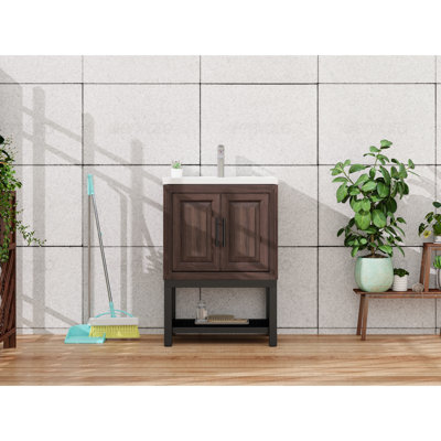 Armoire de salle de bain autoportante de 24 pouces avec lavabo en céramique blanche, robinet texturé, 2 portes de rangement, tablettes évidées, pieds réglables, matériau principal en fer, cadre en aluminium oxydé mat bronze industriel