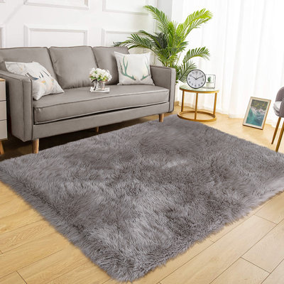 Tapis à poils longs moelleux et moelleux de style moderne et luxueux de couleur unie pour salon