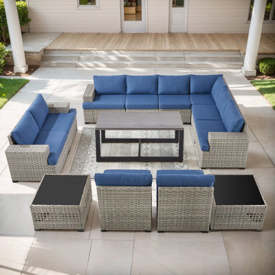 Clute Arnoltice 10 - Person Outdoor Wicker Rattan Patio Sectional Seating Group With Armless Chairs And Coffee Table