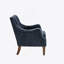 Fauteuil capitonné en polyester bleu marine à 4 pieds